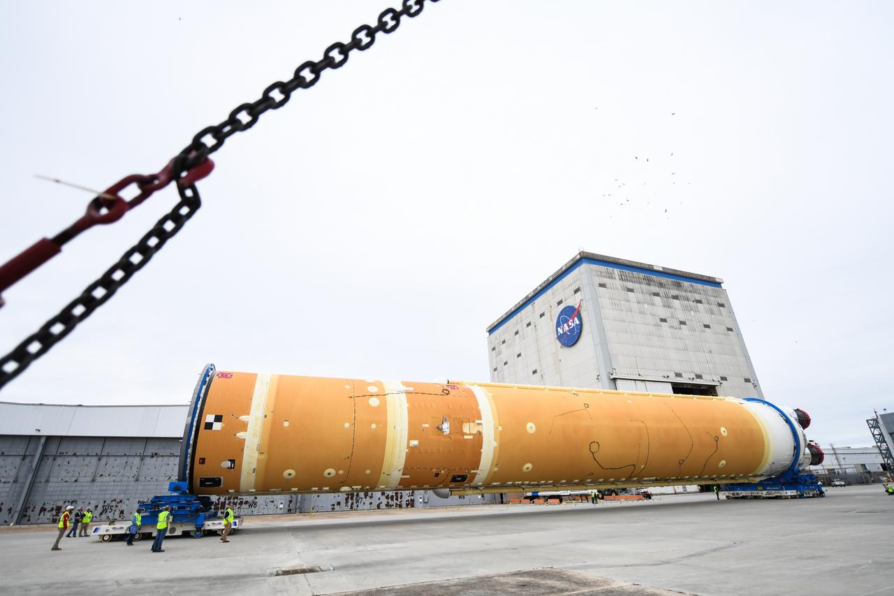 These images show how teams at NASA’s Michoud Assembly Facility in New Orleans moved the core stage, complete with all four RS-25 engines, for NASA’s Space Launch System (SLS) rocket to Building 110 for final shipping preparations on Jan. 1. The SLS core stage includes state-of-the-art avionics, propulsion systems and two colossal propellant tanks that collectively hold 733,000 gallons of liquid oxygen and liquid hydrogen to power its four RS-25 engines. The completed stage, which will provide more than 2 million pounds of thrust to help power the first Artemis mission to the Moon, will be shipped via the agency’s Pegasus barge from Michoud to NASA’s Stennis Space Center near Bay St. Louis, Mississippi, later this month. Once at Stennis, the Artemis rocket stage will be loaded into the B-2 Test Stand for the core stage Green Run test series. The comprehensive test campaign will progressively bring the entire core stage, including its avionics and engines, to life for the first time to verify the stage is fit for flight ahead of the launch of Artemis I.